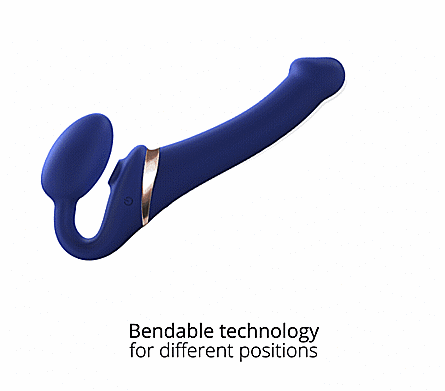 a GIF of the Strap-on-Me Vibrating Licking Strapless Strap-on shows the bendable design of the toy. The shaft is moved upwards and downwards, the insertable bulb is tilted forwards and backwards to showcase the adjustability. The text on the GIF reads "Bendable technology for different positions". | Kinkly Shop