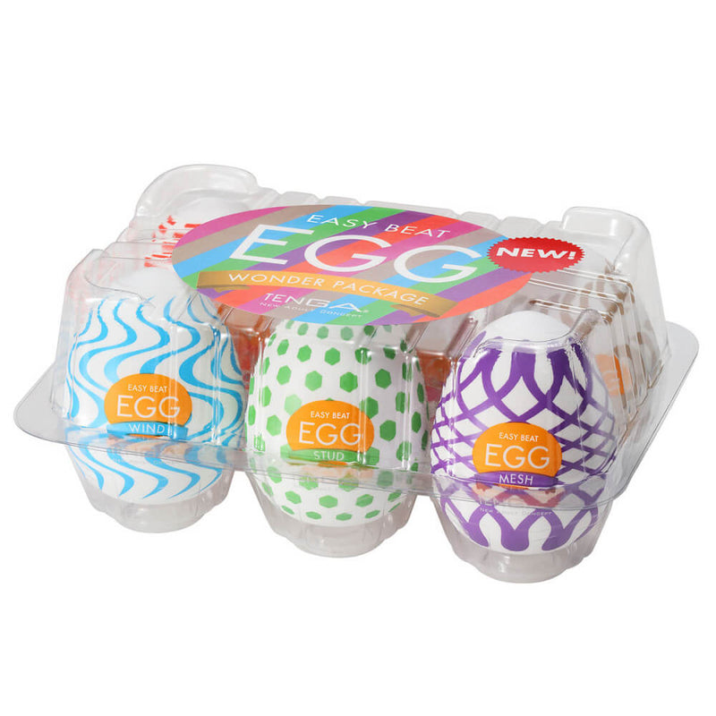 Tenga Egg Wonder variety pack. Six colorful, bright Tenga Eggs are contained in a plastic container that looks like an egg carton from the grocery store. | Kinkly Shop