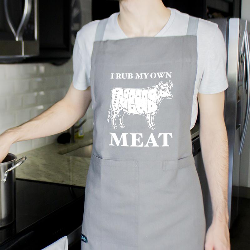 A person wearing the I Rub My Own Meat Apron | Kinkly Shop