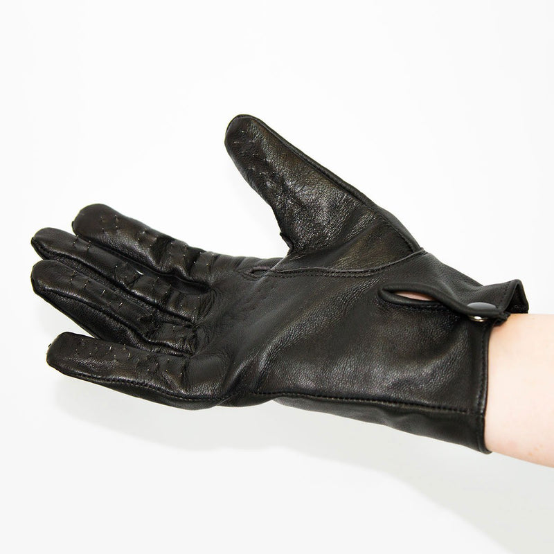 A hand wears the Kinklab Vampire Gloves in front of a plain white background. | Kinkly Shop