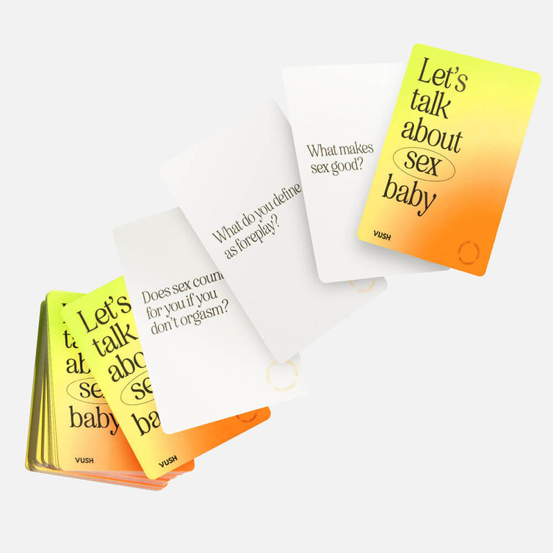 Pile of the Curiosity cards sitting out against a white background. The front of the cards has a yellow-to-orange gradient that says "Let's talk about sex baby". Questions on the three displayed cards states: "What makes sex good? What do you define as foreplay? Does sex count for you if you don't orgasm?" | Kinkly Shop