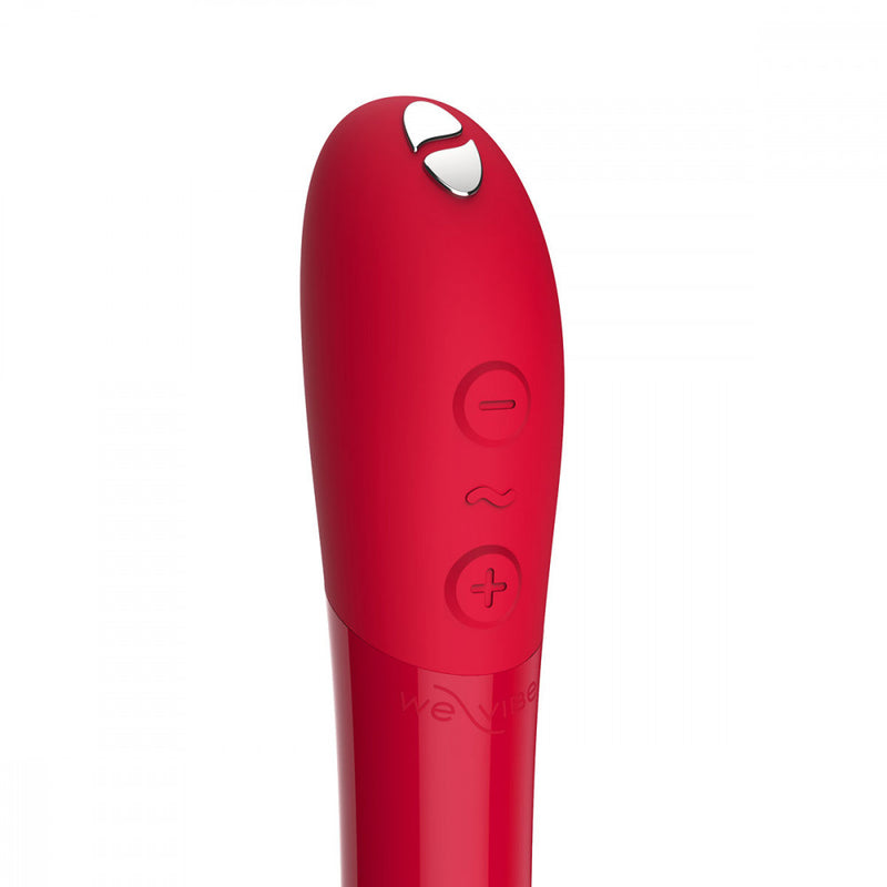 Extreme close-up image that shows the magnetic charging port and the three buttons that control the We-Vibe Tango X | Kinkly Shop