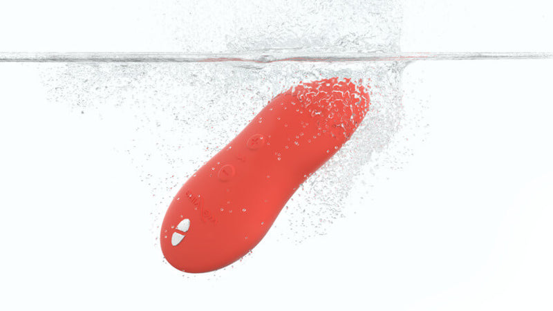 The We-Vibe Touch X underwater. It showcases its waterproof capabilities while little bubbles surrounding the toy. | Kinkly Shop