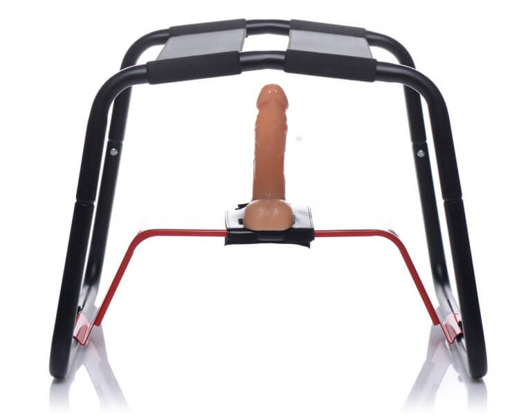 The XR Bangin' Bench with the dildo riser set up underneath it. A dildo is strapped onto the harness on the dildo riser to showcase how the XR Bangin' Bench can be used for hands-free dildo pleasure. | Kinkly Shop